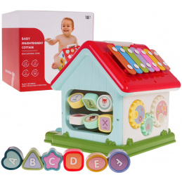 Večnamenska interaktivna hišica s klavirjem