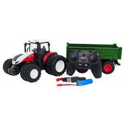 Rdeč R/C traktor z zeleno prikolico